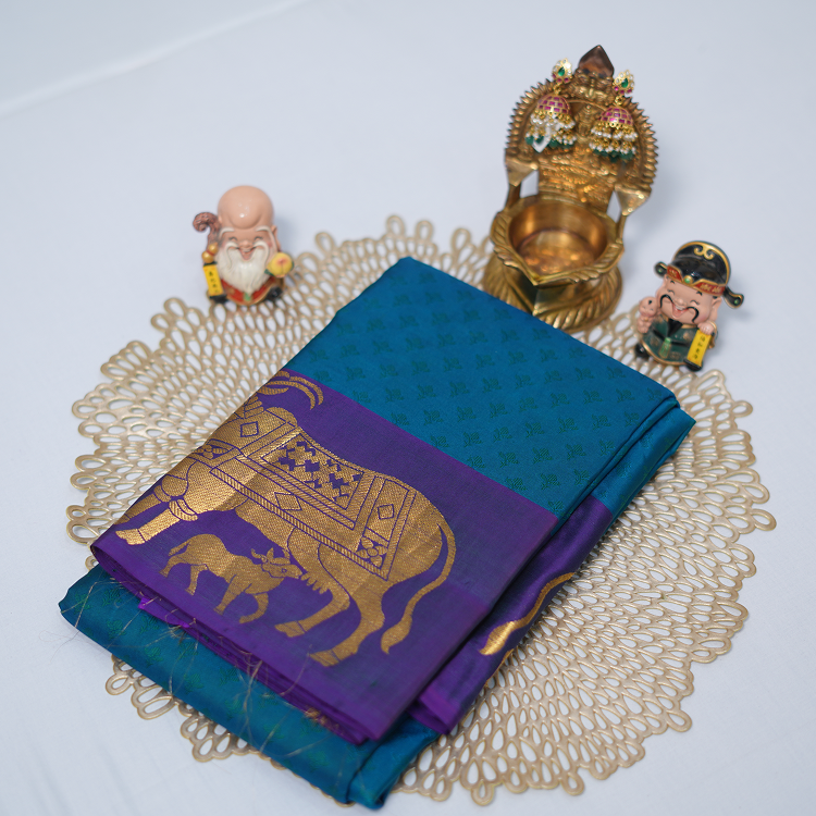 Kanchipuram silk saree with self buttis and beautiful cow and calf weaving in border-Blue & Navy blue