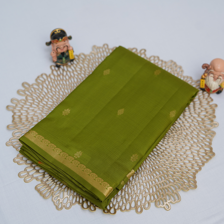 Kanchipuram SIlk saree with small zari border and with small buttis -Parrot green