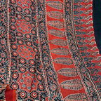 Model silk- hand bandhini with ajrak blouse and pallu-ink blue & red