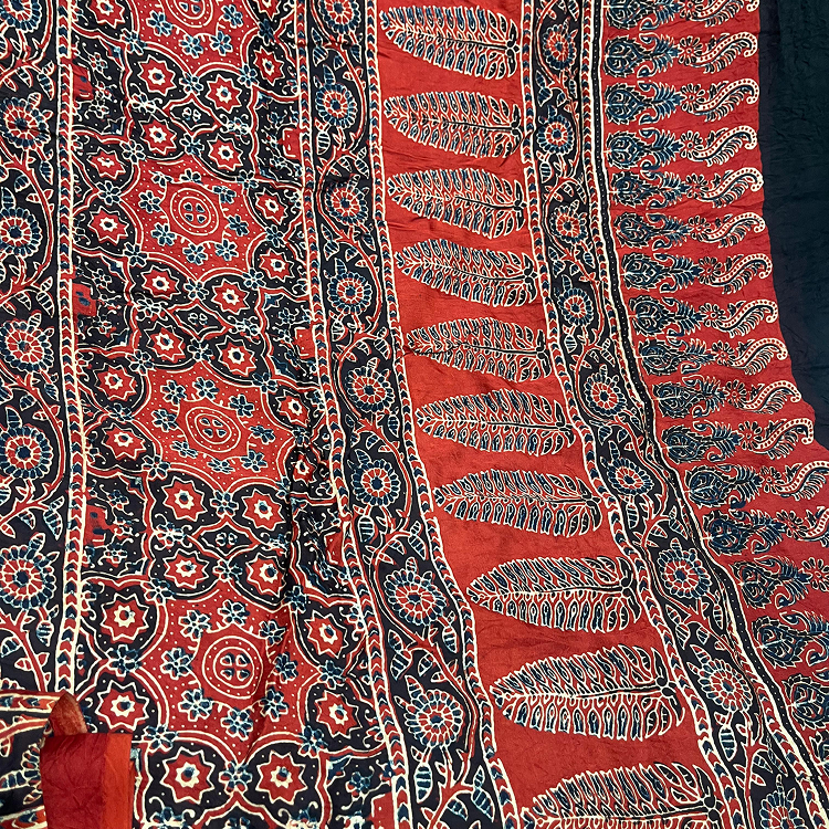 Model silk- hand bandhini with ajrak blouse and pallu-ink blue & red