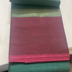 Kanchi cotton-Checks with ganga jamuna border-Black & purple borders and bottle green saree